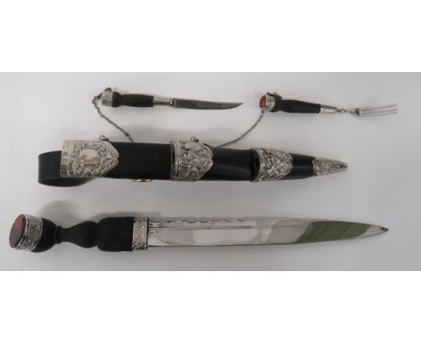 Modern Scottish Military Pattern Dirk 12 inch, single edged, clipped spine blade with narrow fuller. &nbsp;Plated, thistle fe