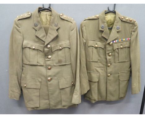 Two WW2 Bedfordshire And Hertfordshire Service Dress Tunicskhaki, single breasted, open collar, service dress tunic.  Pleated