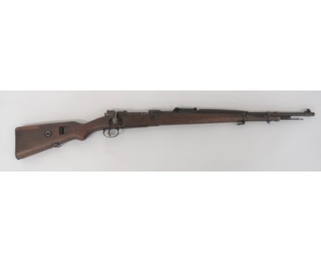 Deactivated WW2 German K98 Mauser Rifle7.92mm, 23 3/4 inch, blued barrel.  Front blade sight and rear ladder sight.  Breech w