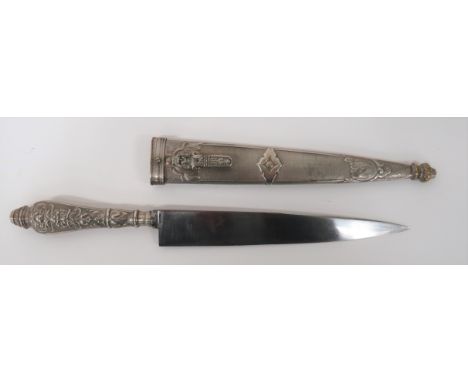 German Made Argentinian Gaucho Knife7 1/4 inch, single edged blade.  White metal, floral decorated hilt.  White metal scabbar