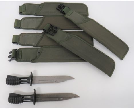 Two SA80 Bayonets7 inch, single edged, clipped point blades.  Short fullers.  Blackened socket hilts.  Button catch not fitte