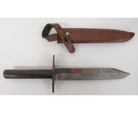 WW2 Australian Pattern Combat Knife  7 inch, heavy set, single edged blade with clipped point. &nbsp;Large offset steel cross