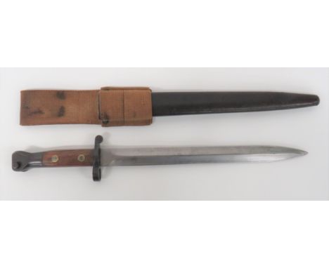 M1888 Commercial Enfield Bayonet12 inch, double edged blade.  Unmarked forte.  Steel muzzle ring, crossguard and pommel.  Thi