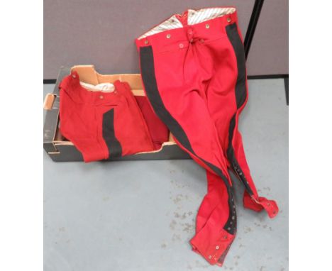 Two Pairs Of French Officer Breeches scarlet, wide leg breeches with black side lines. &nbsp;Lower button fastening. &nbsp;On