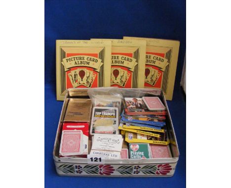 Three cigarette cards albums comprising Gallaher Army badges, Gallahers trains of the world and another of Wills School Arms 