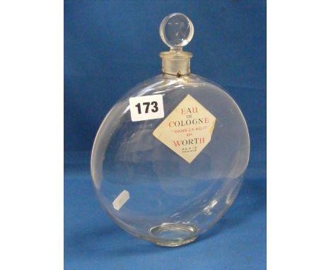 R LALIQUE.  A large perfume bottle made for Worth. The pre-war bottle with the original Worth label. Moulded to the underside