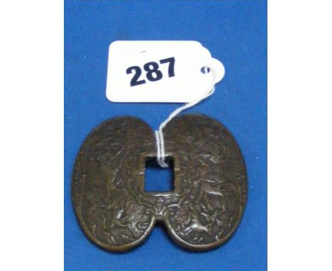 An early heavy cast metal Tsuba or buckle decorated with hunting scenes to front and back, possibly 17th Century.