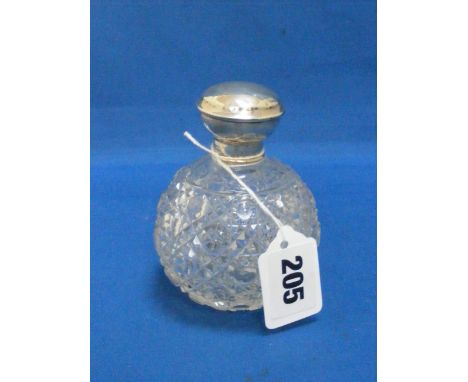 A cut glass silver topped scent bottle, H/M Birmingham 1922.