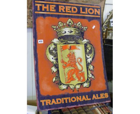 An enamel pub sign for The Red Lion Traditional Ales. 