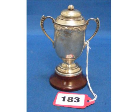 A silver trophy cup on wooden stand, H/M Birmingham 1928.