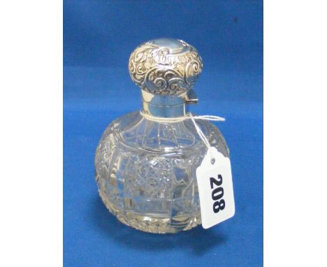 A silver topped glass scent bottle with inner stopper, H/M Birmingham 1897,