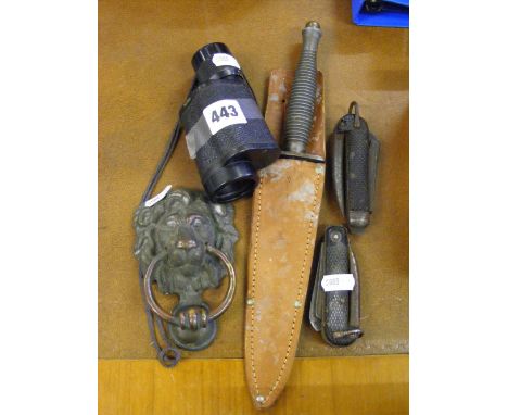 A military Commando knife, two military Jack knives, a small Russian monocular and a lions head door knocker.    