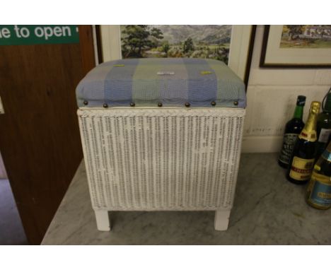 A white painted loom stool