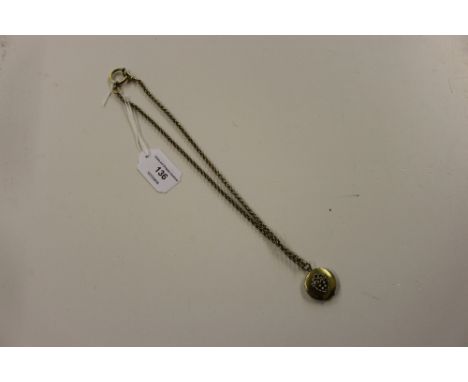 A pinch beck chain with pearl set locket