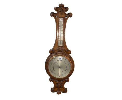 Carved oak barometer having silvered dial, J. Durkin, Middlesbrough.