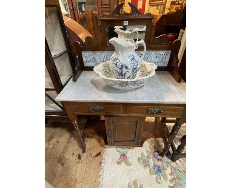 Victorian walnut, marble topped, tiled and mirror back washstand, together with a toilet jug and basin (washstand 126cm by 92