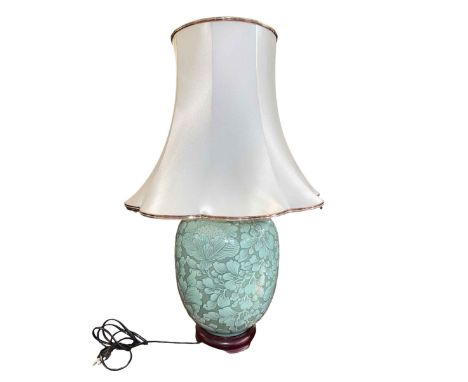 Celadon table lamp and shade, 66cm high.