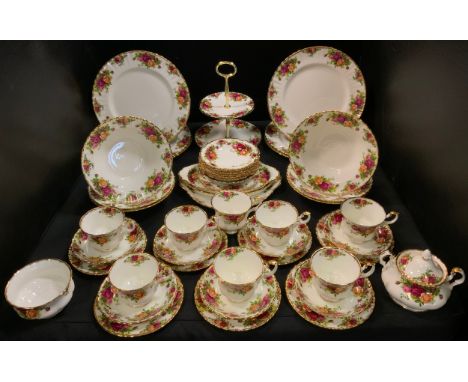 A Royal Albert Old Country Roses tea service, for eight, including two tier cake plate;  serving dishes, etc 