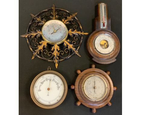 A Walker and Hall barometer, leafy wirework frame;  an oak barometer;  others (4) 
