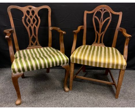 A 19th century Hepplewhite elbow chair;  a Chippendale elbow chair (2) 