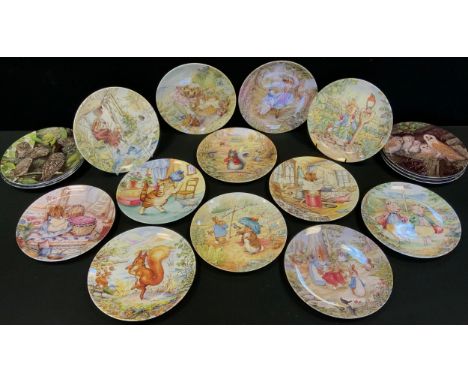 A set of eleven Danbury Mint The World of Beatrix Potter collectors plates;  a set of four Safe in the Nest collectors plates