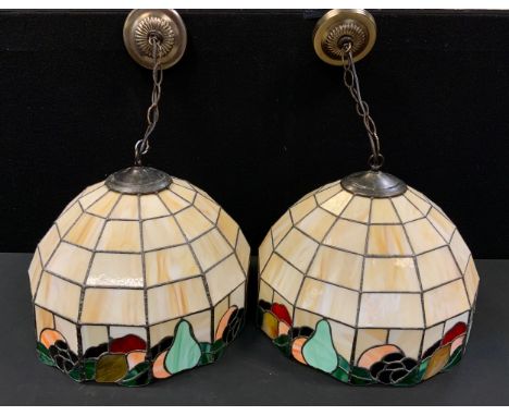 A pair of stained and leaded marbleized glass light fittings, dodecagonal body with Fruit collar of Apples, Pears, Grapes, Or