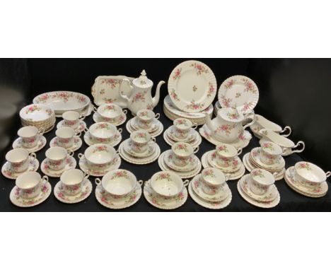 A Royal Albert Moss Rose dinner and tea service, comprising 12 dinner plates, 8 dessert plates, 6 cheese plates, 9 side plate