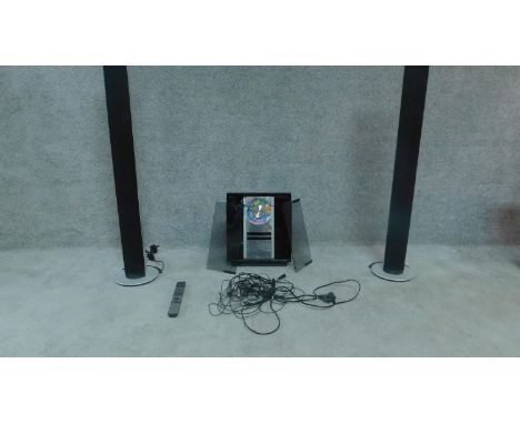 A Bang and Olufsen CD player with speakers system H.111cm (speaker) 