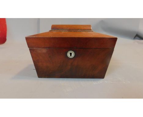A Regency mahogany two section sarcophagus shaped tea caddy. H.15cm W.23cm D.12cm (lid detached) 