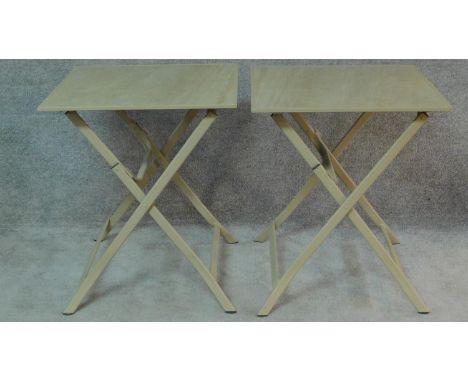 A pair of metal and ceramic tiled folding garden tables. H.74 W.63 D.63cm 