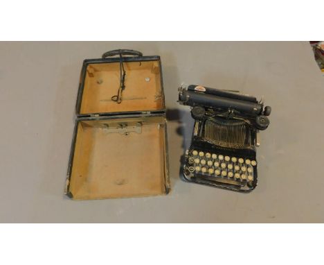 A Corona antique typewriter in carrying case. 