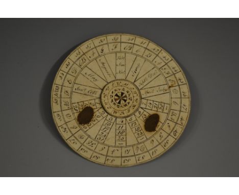 A William IV ink manuscript perpetual calendar, inscribed on card, revolving centre, marked out from 1833 to 1860, 7.5cm diam
