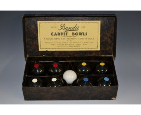 A set of Banda carpet bowls, by Brookes & Adams Ltd, Birmingham, cased, 23.5cm wide overall   