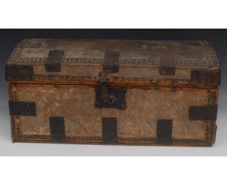 A George III pony skin domed rectangular trunk, hinged cover, outlined throughout with brass studwork, iron carrying handles 