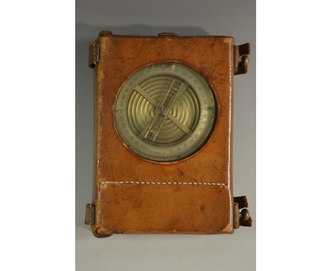 A German field compass, possibly military, by F.W. Breithaupt & Sohn, Cassel, 7.5cm silvered register, aluminium housing, lea
