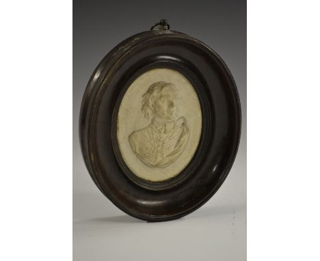 A 19th century Tassie type composition oval portrait plaque, in relief with Oliver Cromwell, bust length, 8.5cm X 6.5cm, pear