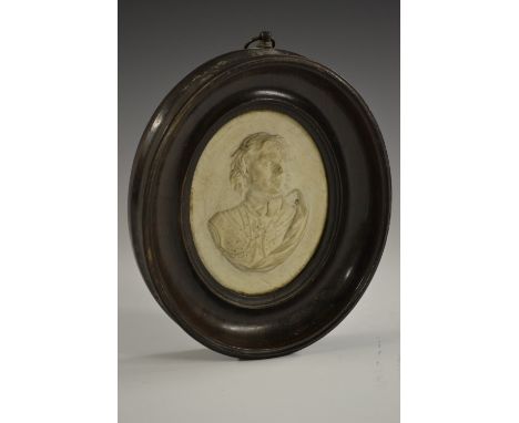 A 19th century Tassie type composition oval portrait plaque, in relief with Oliver Cromwell, bust length, 8.5cm X 6.5cm, pear