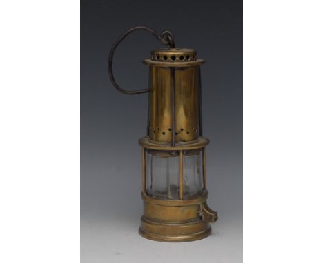 Mining - a 19th century brass and iron Clanny miner's lamp, pierced canopy, conical metal tube, glass chamber, 24cm high