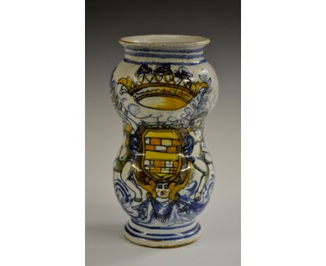 A maiolica albarello drug jar, of waisted form, decorated in tones of blue, yellow, green and manganese with a crowned armori