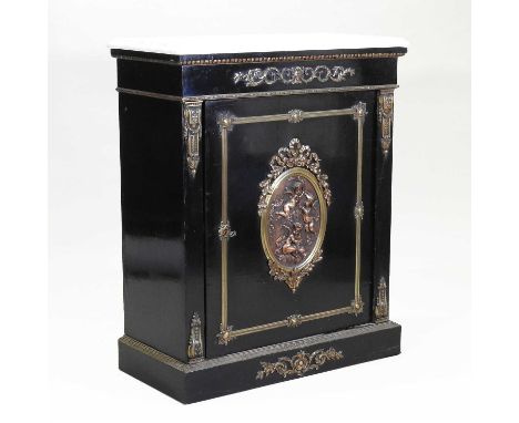 A good 19th century French ebonised and brass mounted pier cabinet, having a later white marble top, enclosed by a panelled d