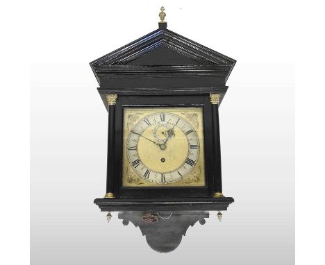 A George III style ebonised hood clock, 20th century, the case surmounted by an angled cornice, flanked by columns, the brass