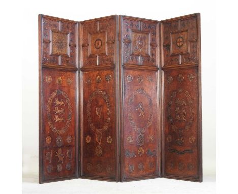 An early 20th century oak and embossed leather four fold screen, the panels decorated with English, Irish and Scottish emblem