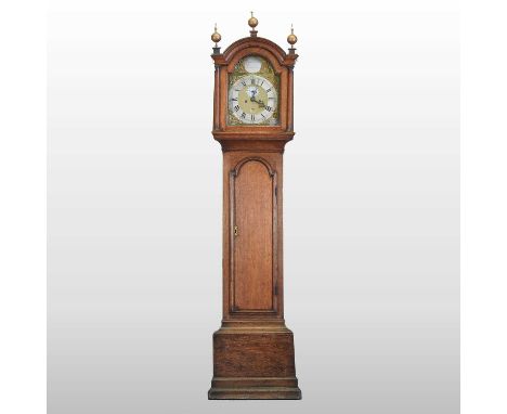 A George III oak case longcase clock, the oak case surmounted by gilt painted finials, the brass dial signed James Smyth, Sax