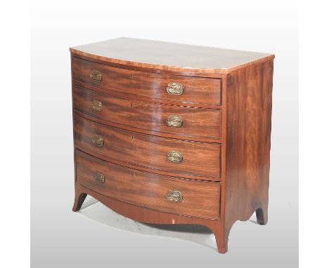 A 19th century mahogany and crossbanded bow front chest, containing four long graduated drawers, on swept bracket feet97w x 5