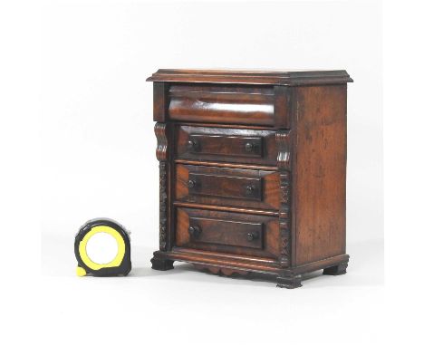 A Victorian mahogany apprentice miniature Scottish chest, containing four long drawers, between columns, on bracket feet23w x