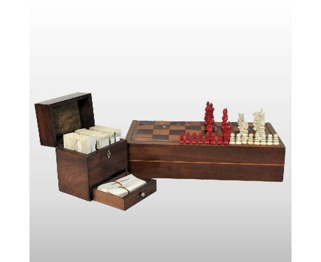 A 19th century turned ivory chess set, highest 8cm, in a wooden folding inlaid games box, together with a George III mahogany