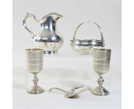 An early 20th century Russian silver cream jug, 10cm high, together with a Russian silver bowl, with a gilt interior and swin