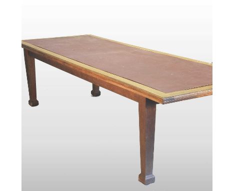 A large Edwardian light oak library table, the red inset top with a moulded edge, on square legs306w x 107d x 78h cm