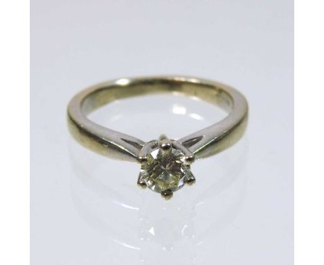 An 18 carat white gold solitaire diamond ring, 0.50 carats, 4.4g, size K