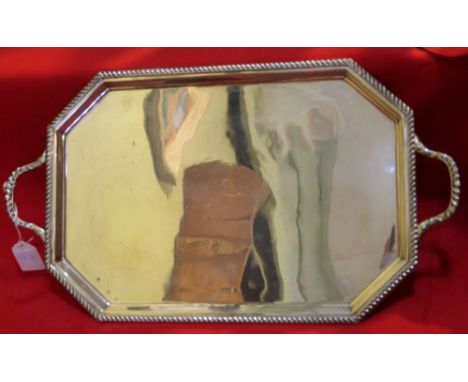 An early 20th century silver two handled tray, gadrooned edge, rectangular form with canted corners, Sheffield 1922, 1265g